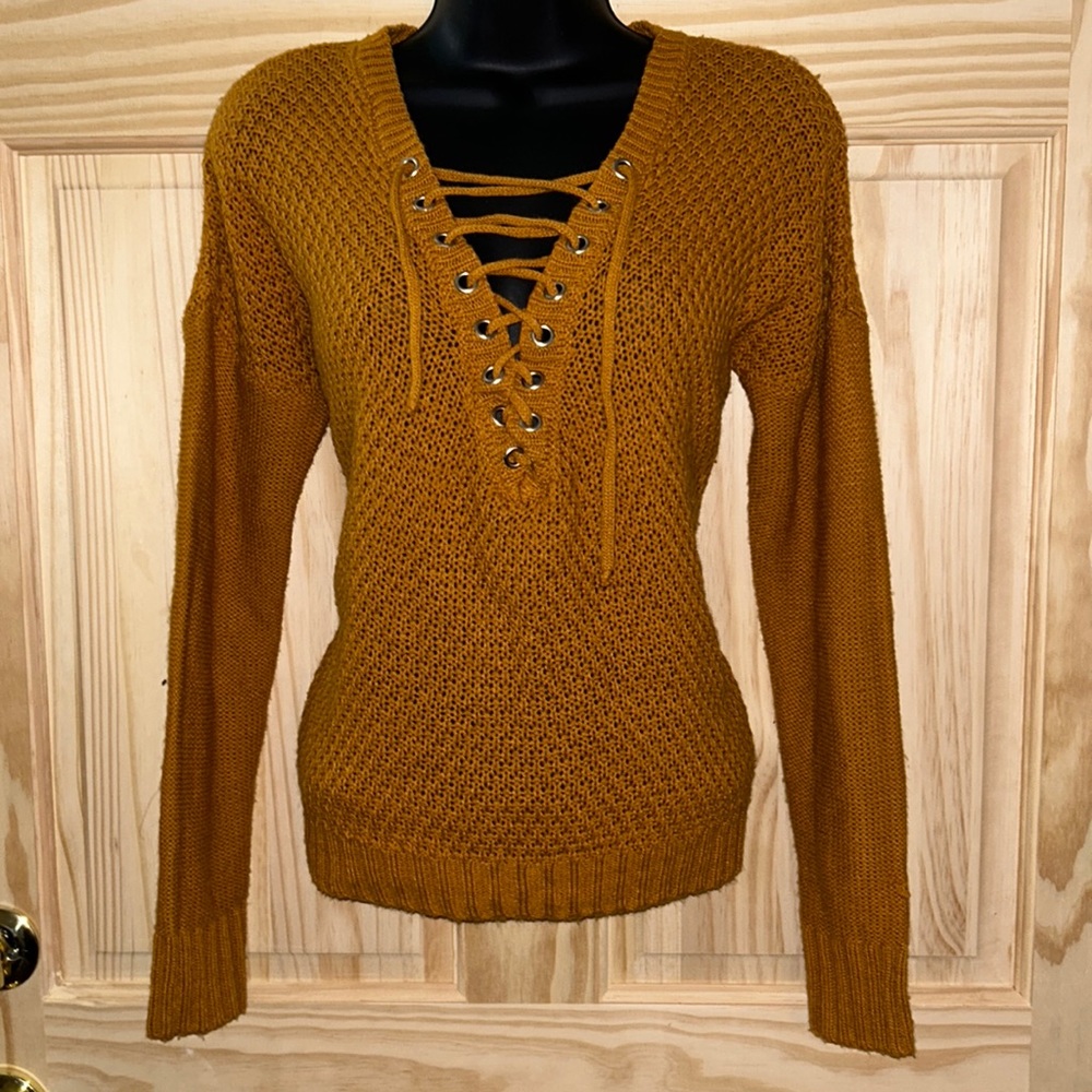 Yellow lace-up sweater
